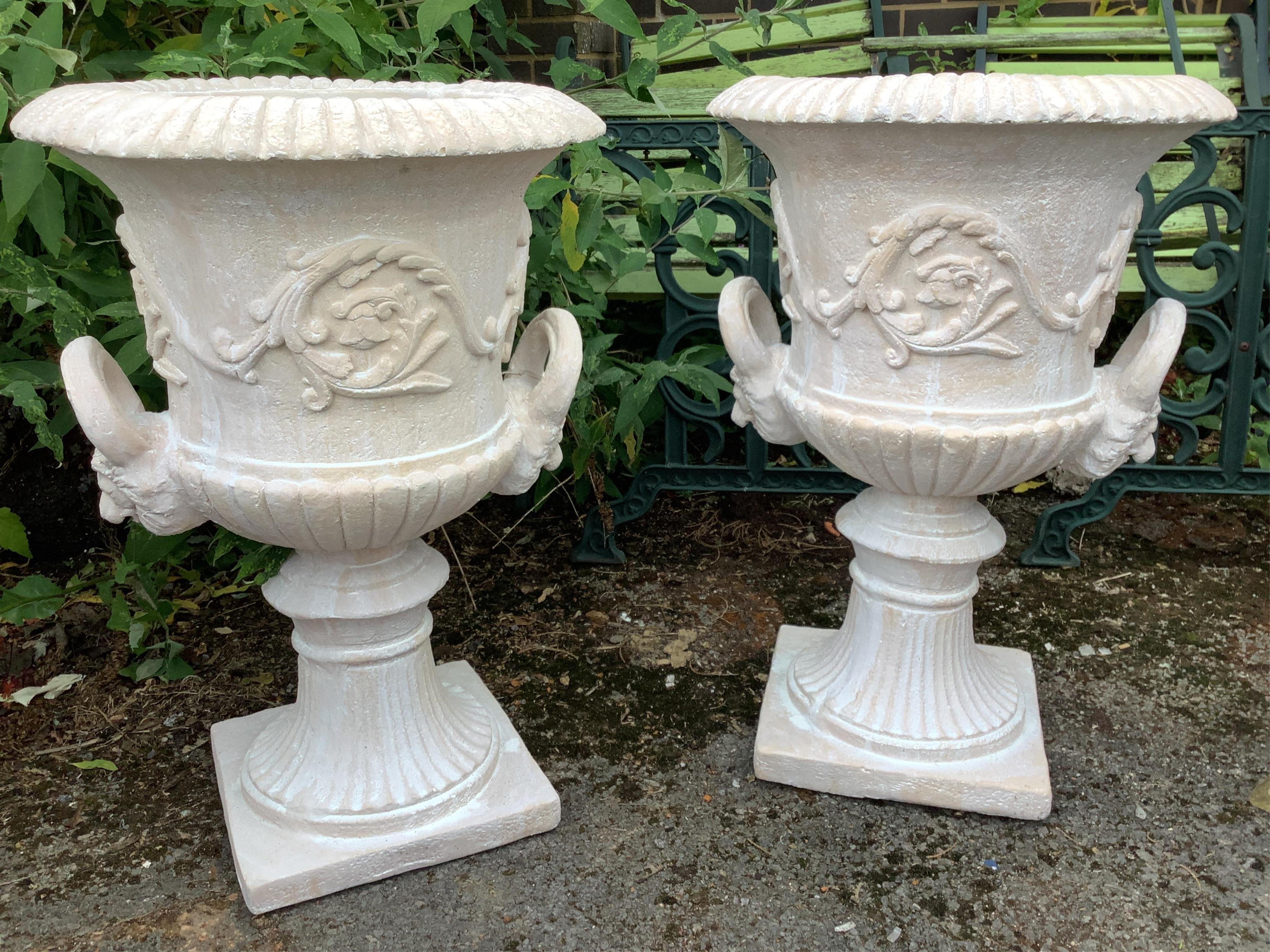 A pair of composition faux marble campana garden urns, width 48cm, height 73cm. Condition - good
